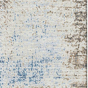 HomeRoots 9' X 12' Khaki Silver & Blue Abstract Area Rug - Washable, UV Protected, Perfect for High-Traffic Spaces 693173