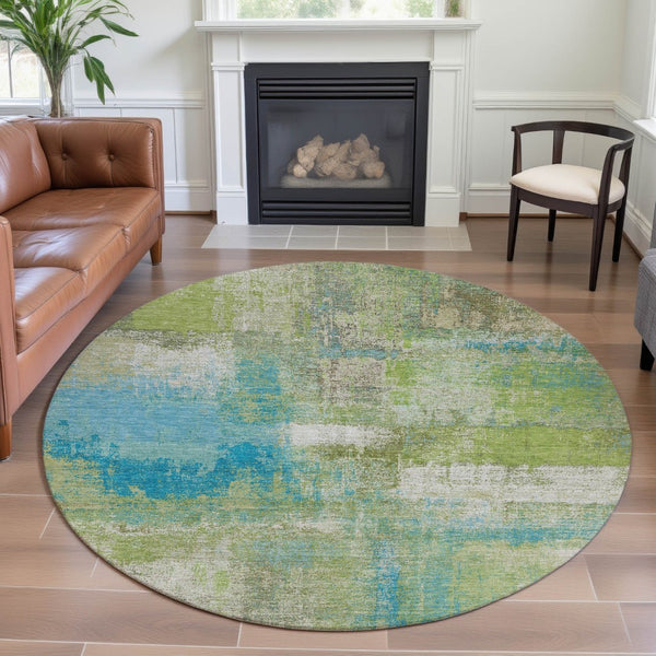 HomeRoots 8' X 8' Vibrant Lime Green Teal & Ivory Abstract Washable Round Rug with UV Protection & Non-Slip Backing 693177