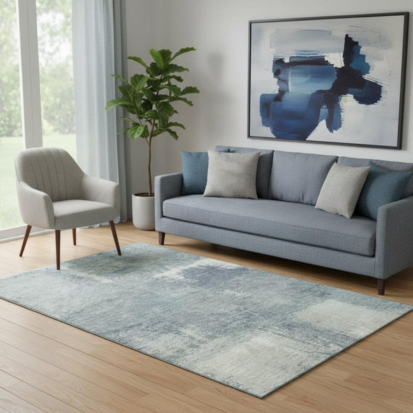 HomeRoots 5' X 8' Sage Ivory and Blue Abstract Area Rug – Durable, Washable, UV-Protected for Everyday Life 693188