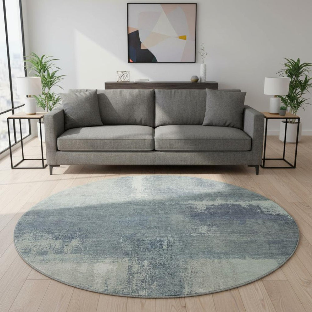 HomeRoots 8' X 8' Sage Ivory and Blue Abstract Round Rug - Washable, UV-Protected, Non-Slip for Family Homes 693189
