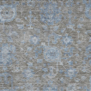 HomeRoots 5' X 8' Gray and Blue Floral Area Rug – Washable, UV Protected, Durable, Family-Friendly Design 693296