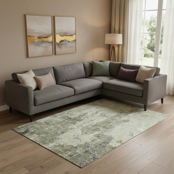 HomeRoots 10' X 14' Artichoke Green Abstract Area Rug – Washable, Stain-Resistant, UV Protected & Non-Slip Backing 693378