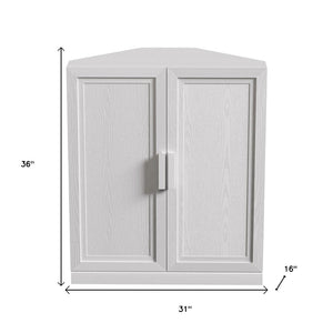 HomeRoots 31" White Wood Corner Accent Cabinet - Stylish Storage Solution for Small Spaces & Modern Decor! 693406