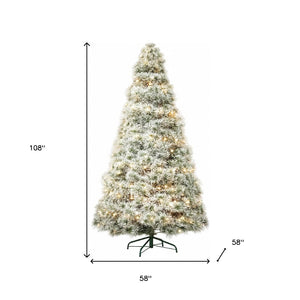 HomeRoots 6' Enchanting Pre-Lit Flocked Spruce Christmas Tree with 8 Lighting Modes for a Magical Holiday Glow 108 693414
