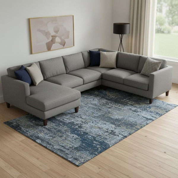 HomeRoots 9' X 12' Contemporary Blue Ivory Gray Abstract Area Rug - Washable, Stain Resistant, UV Protected 693425