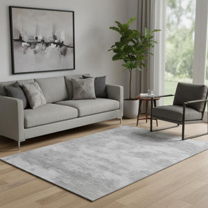 HomeRoots 5' Silver and Gray Abstract Washable Area Rug - Durable, Stain Resistant, UV Protected & Non-Slip! 693440