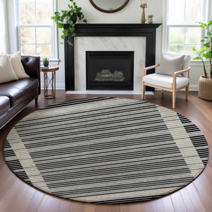 HomeRoots 8' X 8' Stylish Black, Gray, and Silver Striped Washable Round Rug with UV Protection for Durability 693453