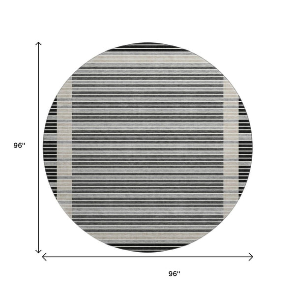 HomeRoots 8' X 8' Stylish Black, Gray, and Silver Striped Washable Round Rug with UV Protection for Durability 693453