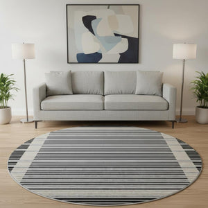 HomeRoots 8' X 8' Stylish Black, Gray, and Silver Striped Washable Round Rug with UV Protection for Durability 693453