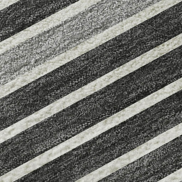 HomeRoots 9' X 12' Stylish Black Gray Silver Striped Washable Area Rug with UV Protection for Durability 693455