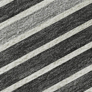 HomeRoots 10' X 14' Stylish Black, Gray & Silver Striped Washable Area Rug with UV Protection & Non-Slip Backing 693456