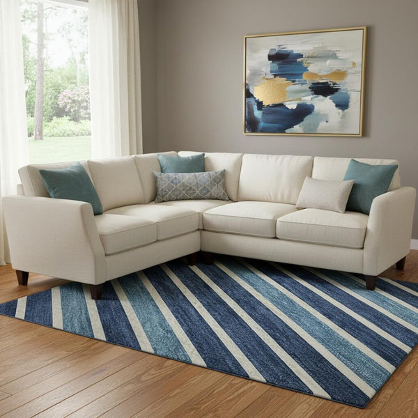 HomeRoots 8' Sky Blue, Ivory & Navy Striped Area Rug - Washable, UV Protected, Stain Resistant for High-Traffic Areas 693502