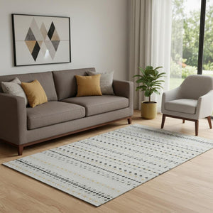 HomeRoots 5' X 8' Silver Gray and Gold Striped Washable Area Rug with UV Protection for Stylish Spaces 693560
