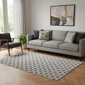 HomeRoots 5' X 8' Ivory Black and Gray Geometric Area Rug - Stain Resistant, UV Protected, Easy-Care Design! 693650