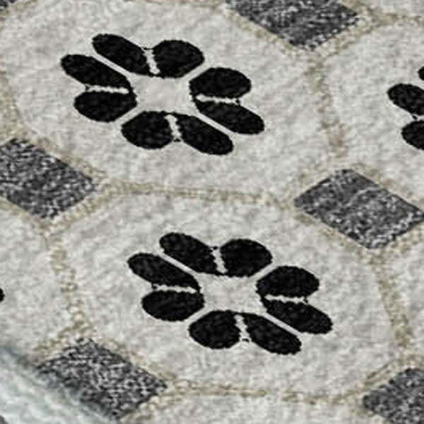HomeRoots 5' X 8' Ivory Black and Gray Geometric Area Rug - Stain Resistant, UV Protected, Easy-Care Design! 693650