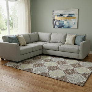 HomeRoots 8' Chocolate Beige and Blue Floral Area Rug - Washable, UV Protected, Durable for High-Traffic Spaces 693724