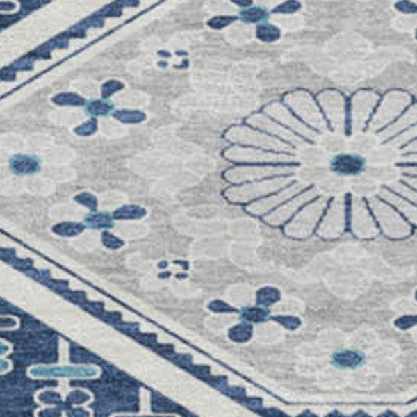 HomeRoots 8' X 8' Navy Blue Floral Round Rug - Durable, Washable, UV-Protected with Non-Slip Backing for Home Use 693741