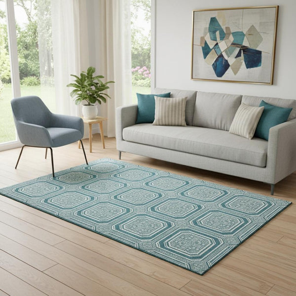 HomeRoots 5' X 8' Teal And Ivory Geometric Area Rug – Washable, Stain-Resistant, UV Protected for Homes 693836