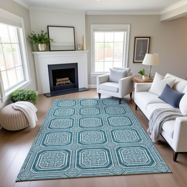 HomeRoots 5' X 8' Teal And Ivory Geometric Area Rug – Washable, Stain-Resistant, UV Protected for Homes 693836