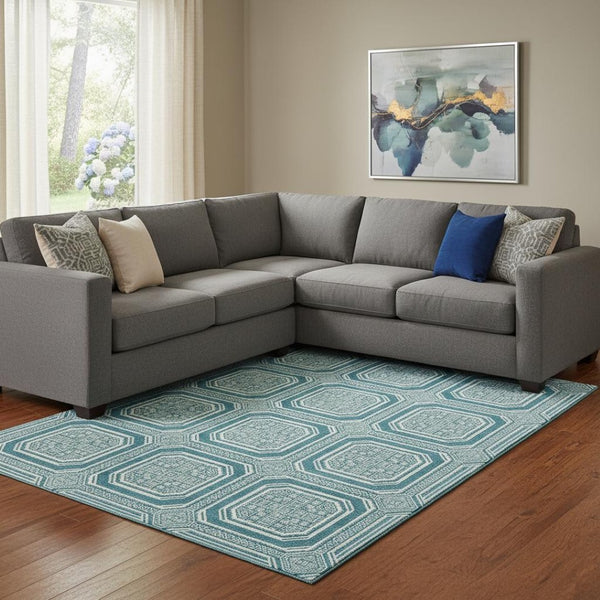 HomeRoots 8' Teal And Ivory Geometric Area Rug - Washable, UV-Protected, Perfect for High-Traffic Spaces! 693838