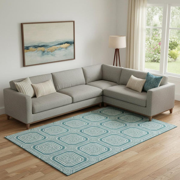 HomeRoots 9' X 12' Teal and Ivory Geometric Area Rug - Durable, Washable, UV-Protected for High-Traffic Spaces 693839
