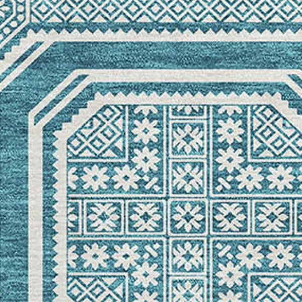 HomeRoots 9' X 12' Teal and Ivory Geometric Area Rug - Durable, Washable, UV-Protected for High-Traffic Spaces 693839