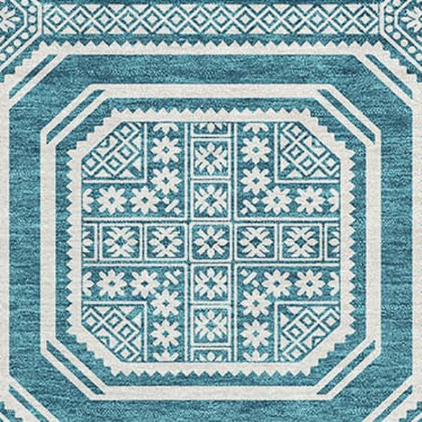 HomeRoots 9' X 12' Teal and Ivory Geometric Area Rug - Durable, Washable, UV-Protected for High-Traffic Spaces 693839