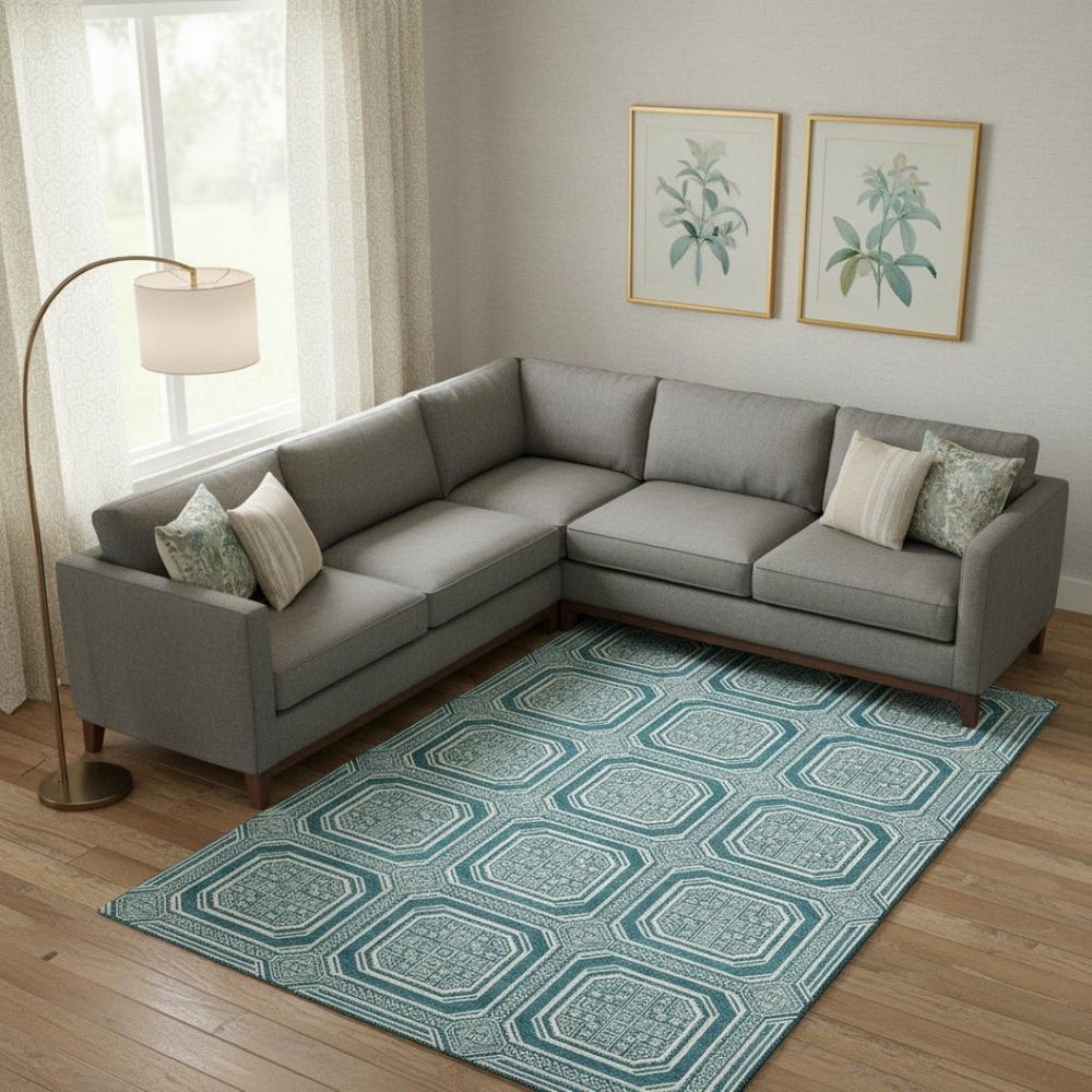 HomeRoots 10' Teal and Ivory Geometric Area Rug - Washable, UV Protected, Non-Slip for Modern Living Spaces 693840