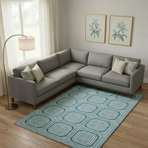 HomeRoots 10' Teal and Ivory Geometric Area Rug - Washable, UV Protected, Non-Slip for Modern Living Spaces 693840