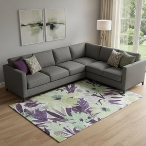 HomeRoots 9' X 12' Floral Area Rug in Purple, Green & Ivory - Washable, UV Protected, Durable for High-Traffic Spaces 693971