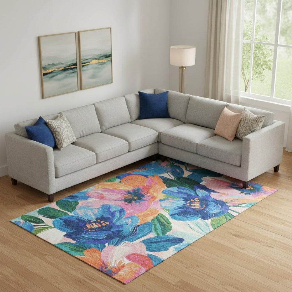 HomeRoots 10' Navy Blue Floral Washable Area Rug with Orange & Pink Accents—UV Protection & Stain Resistant! 693990
