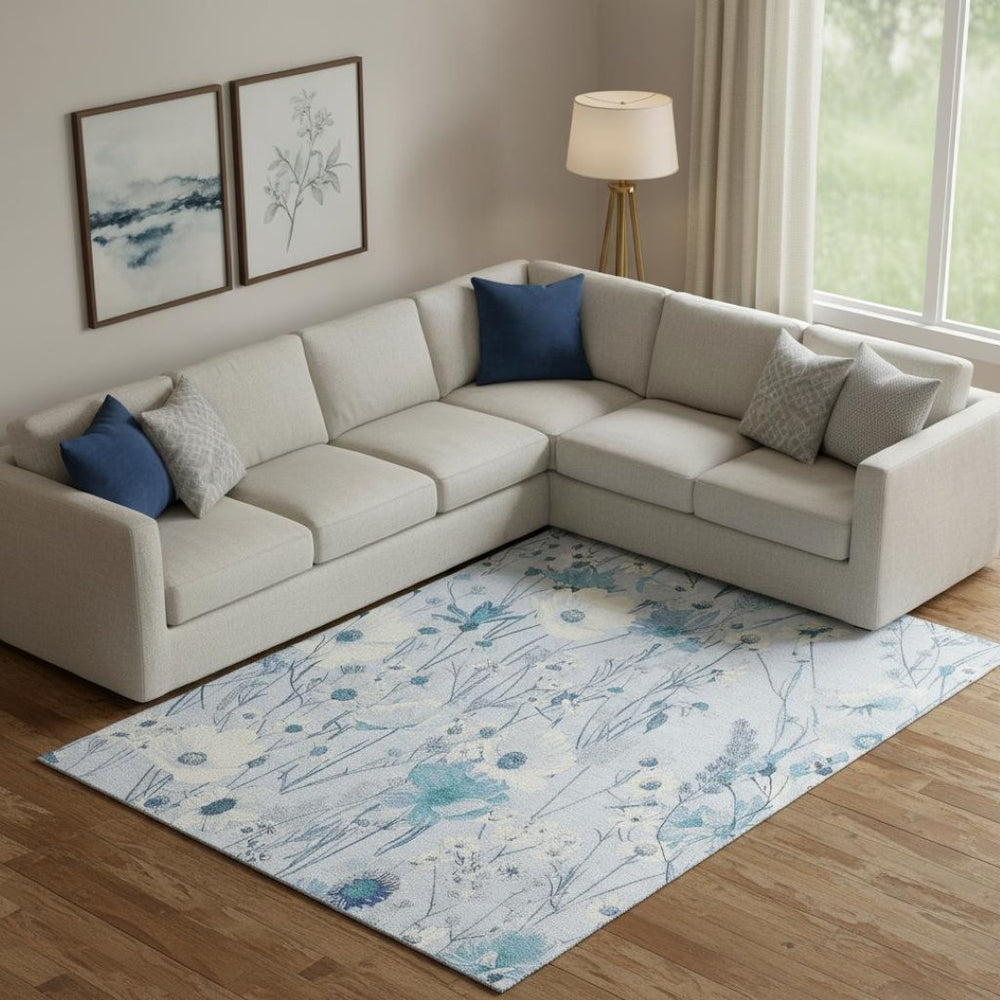 HomeRoots 9' X 12' Sky Blue Floral Area Rug - Stain Resistant, UV Protected, Ideal for High-Traffic Spaces 694079