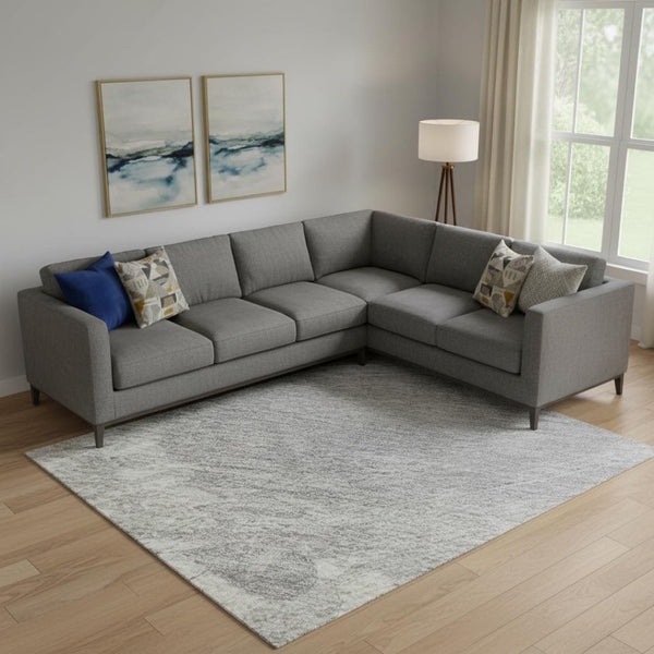 HomeRoots 9' X 12' Washable Beige Gray Silver Abstract Area Rug with UV Protection - Stylish, Durable, and Easy Care 694145