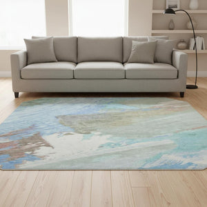 HomeRoots 8' X 8' Abstract Washable Round Rug in Sky Blue, Ivory & Charcoal with UV Protection for Modern Spaces 694155