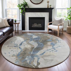 HomeRoots 8' X 8' Abstract Washable Round Rug in Taupe Blue & Ivory - UV Protected, Stain Resistant, Stylish! 694227