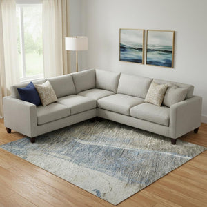 HomeRoots 9' X 12' Abstract Washable Area Rug in Taupe, Blue & Ivory - Stain Resistant & UV Protected! 694229