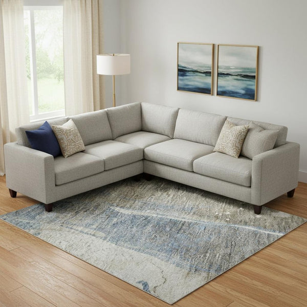 HomeRoots 9' X 12' Abstract Washable Area Rug in Taupe, Blue & Ivory - Stain Resistant & UV Protected! 694229