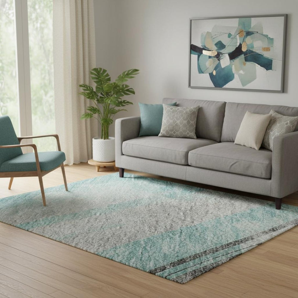 HomeRoots 5' X 8' Stylish Teal Gray and Silver Striped Area Rug – Washable, UV-Protected, Non-Slip Backing! 694298