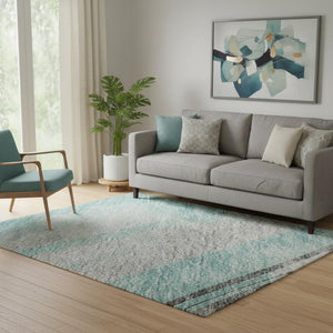 HomeRoots 5' X 8' Stylish Teal Gray and Silver Striped Area Rug – Washable, UV-Protected, Non-Slip Backing! 694298