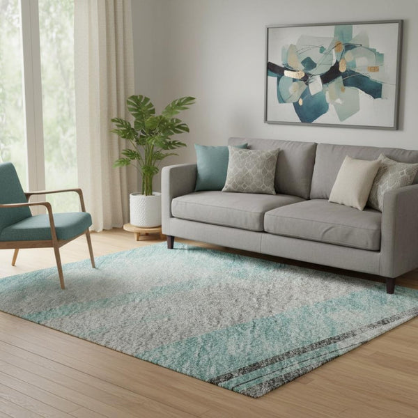 HomeRoots 5' X 8' Stylish Teal Gray and Silver Striped Area Rug – Washable, UV-Protected, Non-Slip Backing! 694298