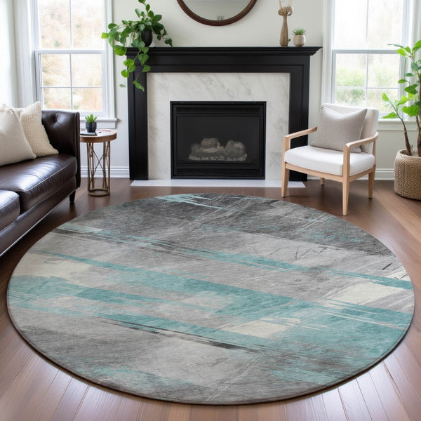 HomeRoots 8' Teal Gray & Silver Striped Washable Round Rug with UV Protection for Stylish, Cozy Living Spaces 694299