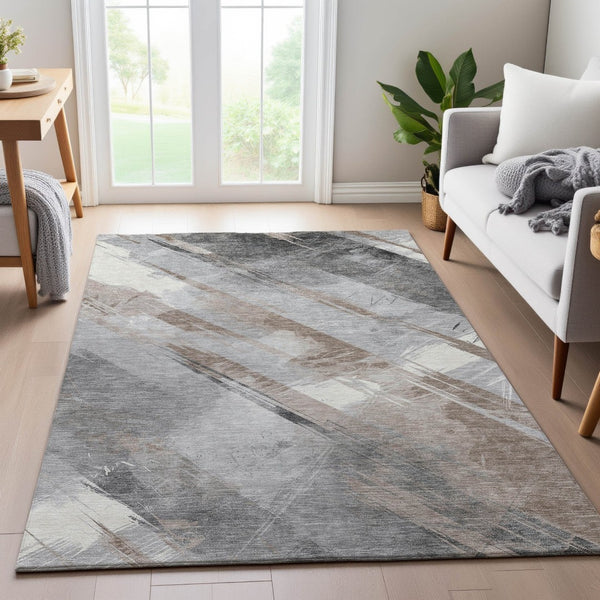 HomeRoots 5' X 8' Taupe Gray & Silver Striped Washable Area Rug – Durable, UV-Protected, and Easy Care Solution! 694304