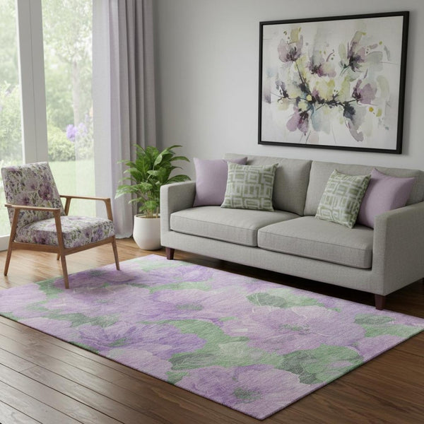 HomeRoots 5' X 8' Floral Area Rug in Lavender and Green - Washable, Stain Resistant, UV Protected for Homes 694318