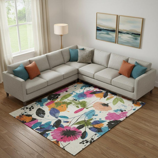 HomeRoots 9' X 12' Floral Area Rug in Ivory, Blue, Pink & Orange – Washable, UV Protected & Stain Resistant! 694369