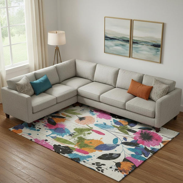 HomeRoots 10' Washable Floral Area Rug in Ivory, Blue, Pink & Orange – UV Protected, Stain-Resistant Style! 694370