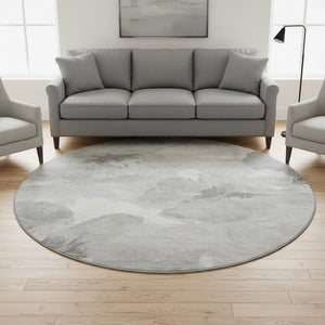 HomeRoots 8' Round Beige Gray Ivory Floral Rug - Washable, UV Protected, Family-Friendly & Stylish Décor Piece 694397