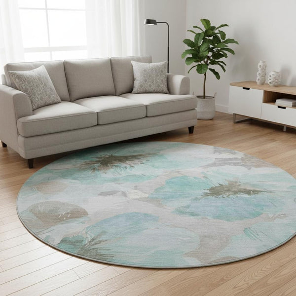 HomeRoots 8' X 8' Teal Ivory Beige Floral Round Rug - Washable, UV-Protected & Stain-Resistant for Homes 694409