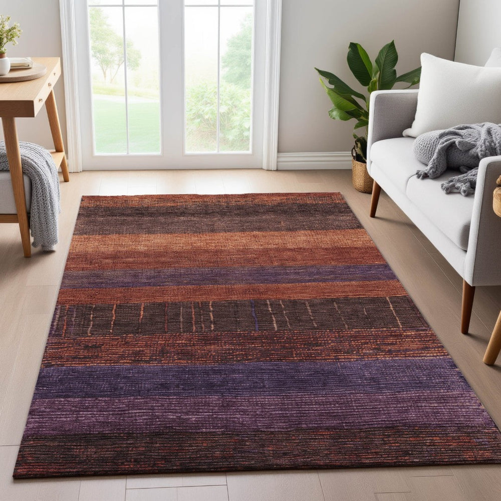 HomeRoots 9' X 12' Washable Striped Area Rug - Rust, Eggplant & Terra Cotta with UV Protection for Busy Homes 694483
