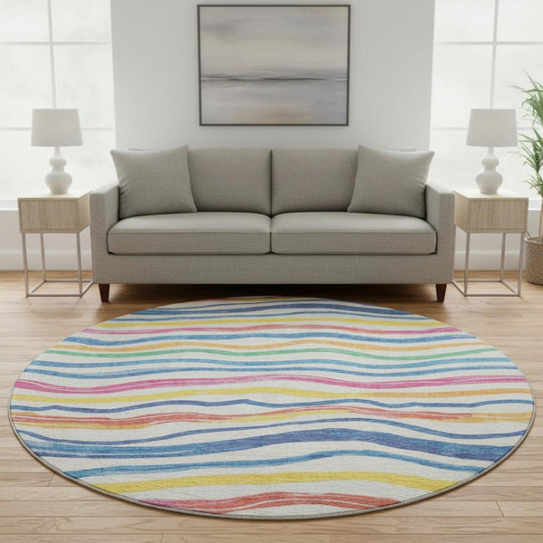 HomeRoots 8' X 8' Striped Washable Round Rug in Ivory, Blue, Yellow & Pink - UV Protected & Stain Resistant! 694559