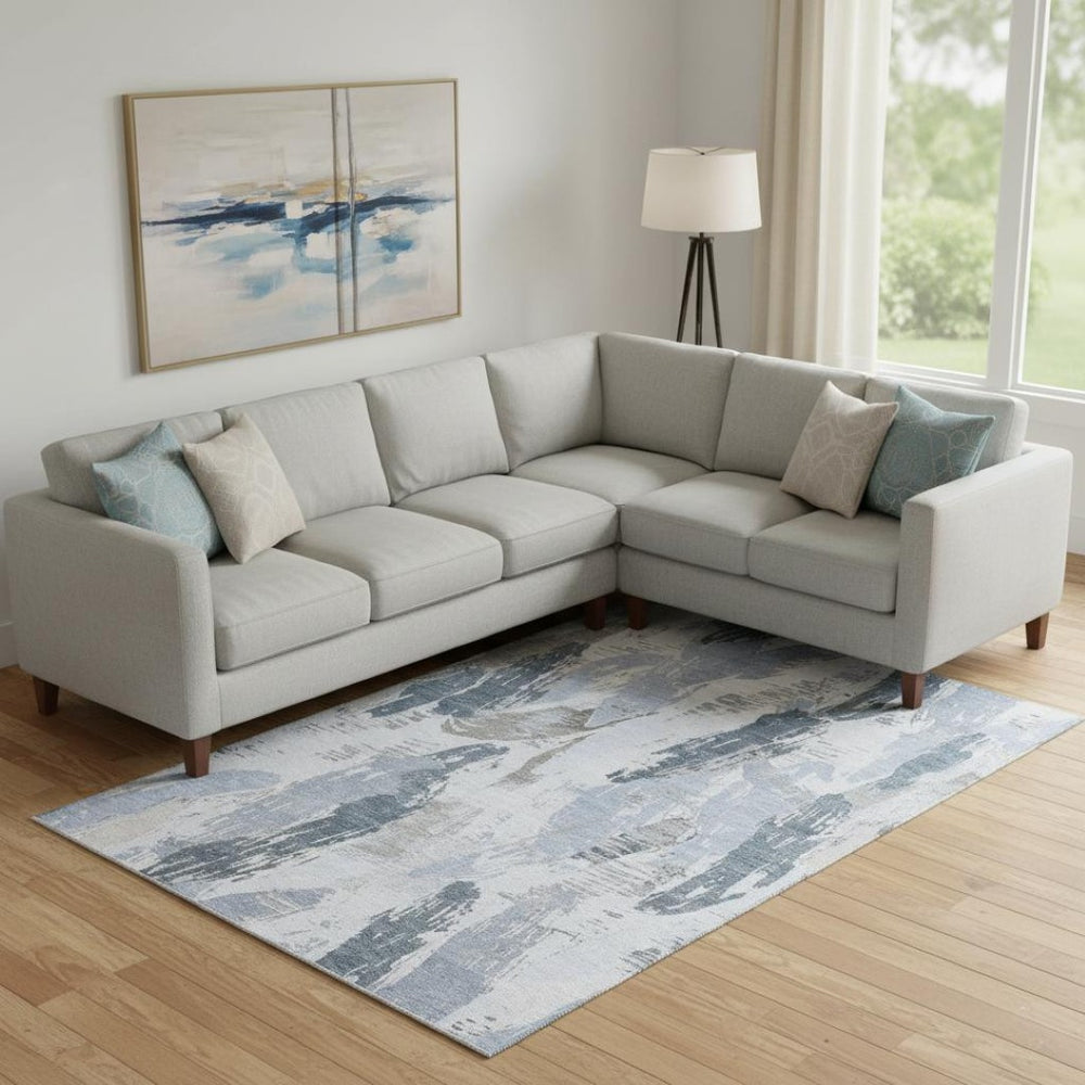 HomeRoots 9' X 12' Sky Blue Gray Ivory Washable Area Rug with UV Protection for Modern Spaces and Easy Care 694663